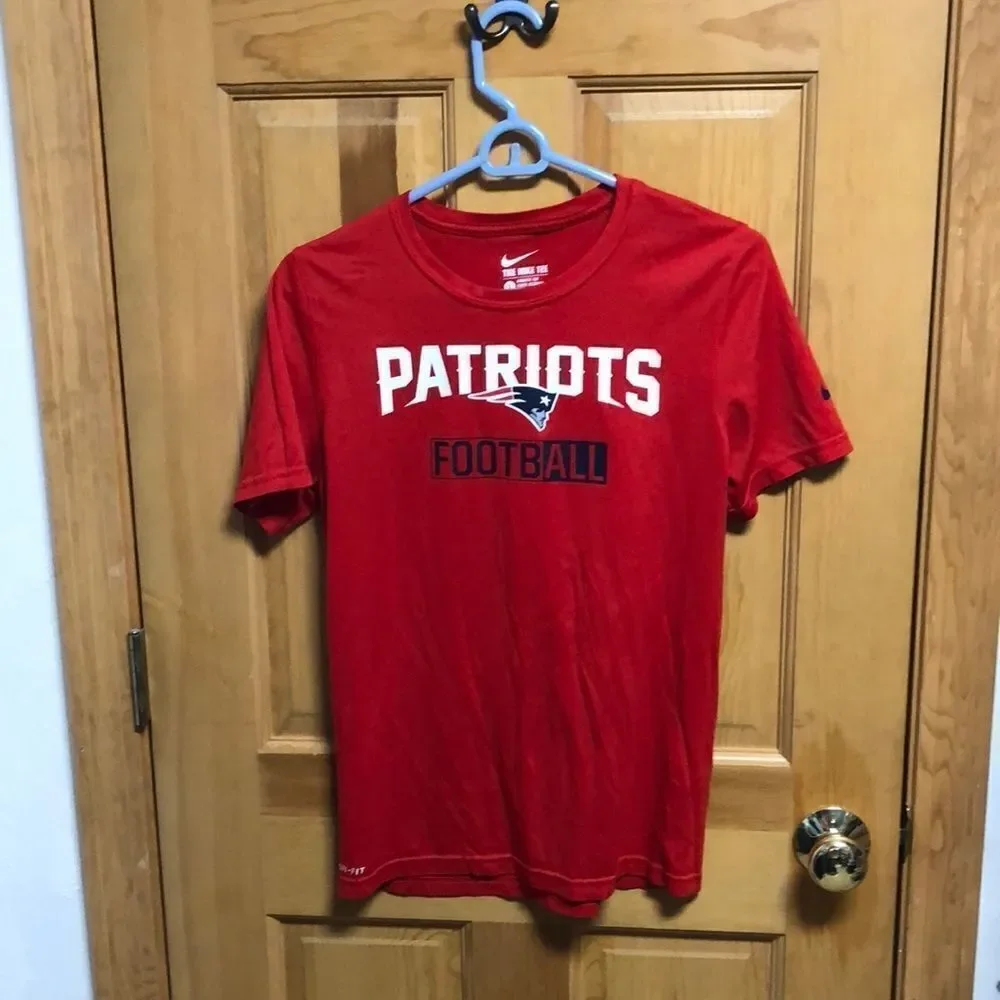 Nike dri-fit patriots  short sleeve shirt size large .